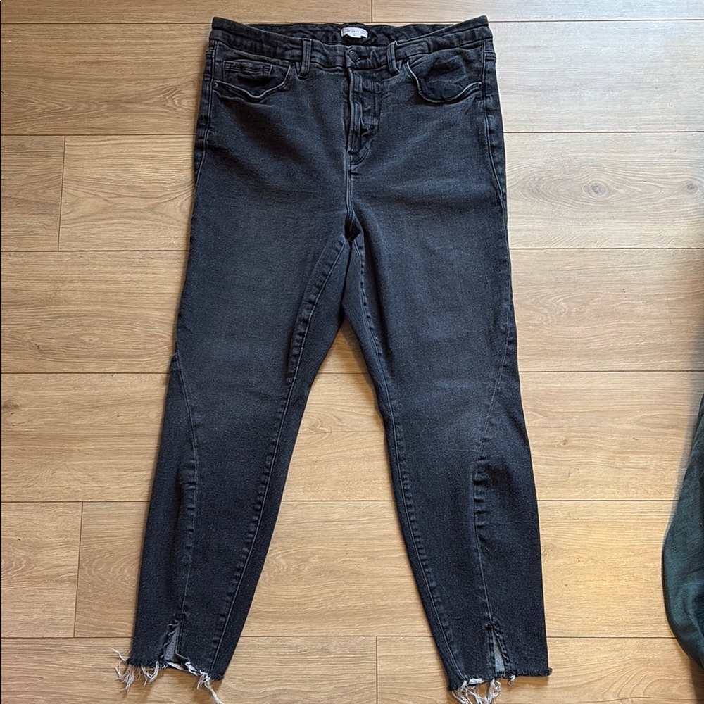 Good American Good Legs Twisted Slit Washed Black Raw Hem Skinny Jeans